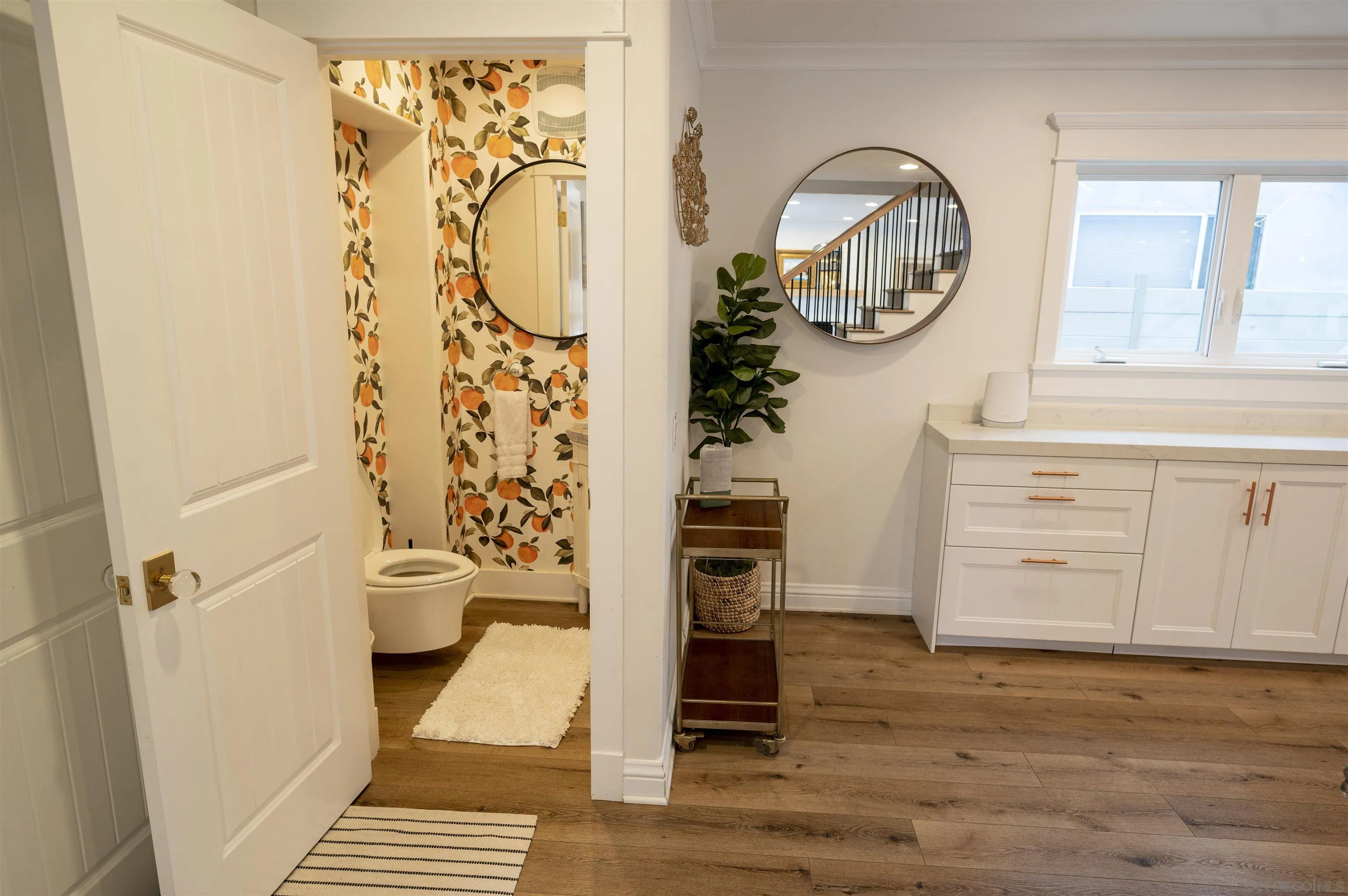 1520 Pendleton Road Coronado, CA 92118 - Photo 25 of 27 a view of a hallway to a livingroom with furniture