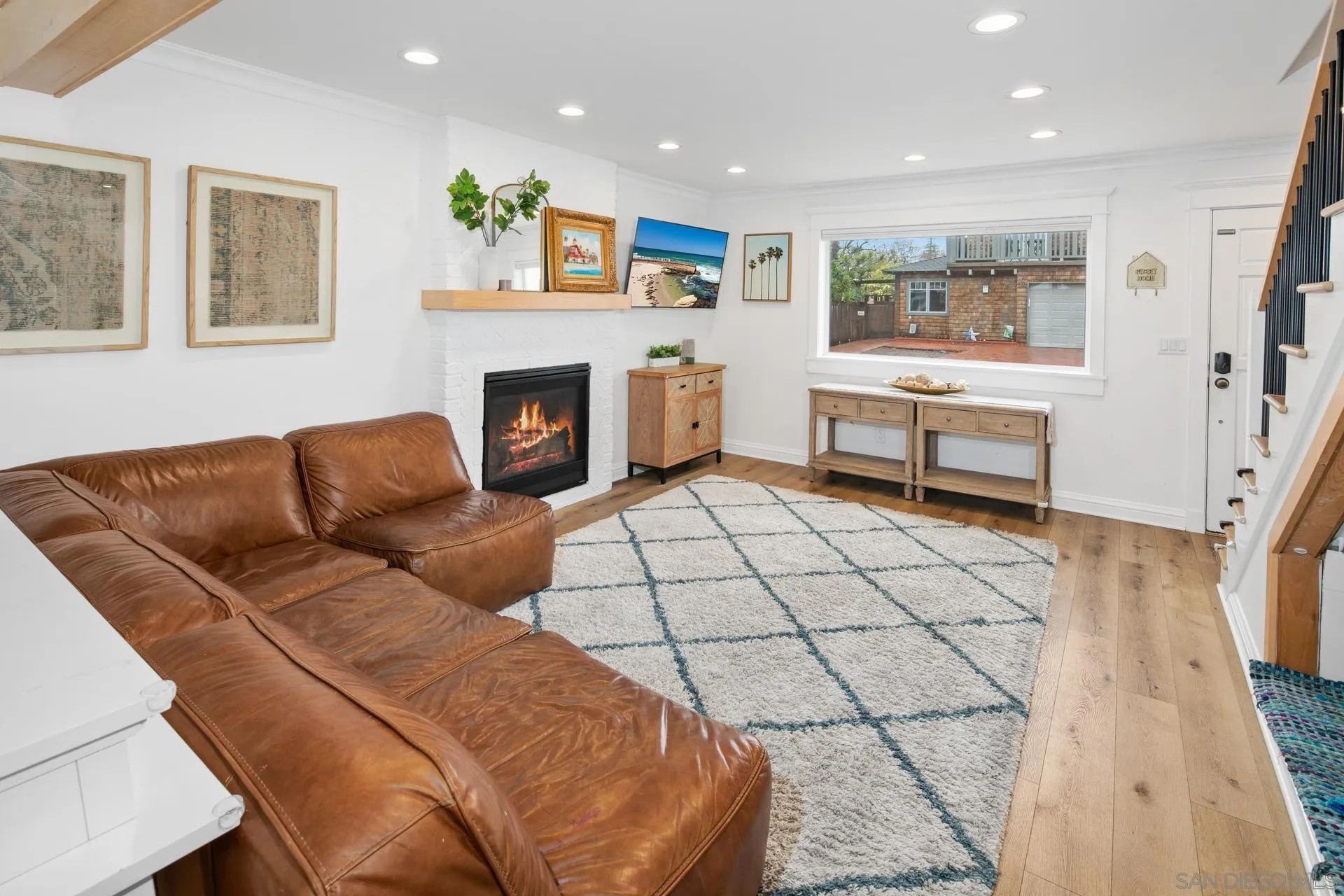 1520 Pendleton Road Coronado, CA 92118 - Photo 10 of 27 a living room with furniture and a fireplace
