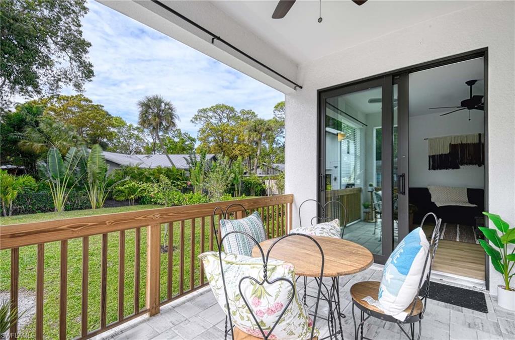1147 Steeves Avenue Naples, FL 34104 - Photo 34 of 35 a view of a chairs and table in the balcony