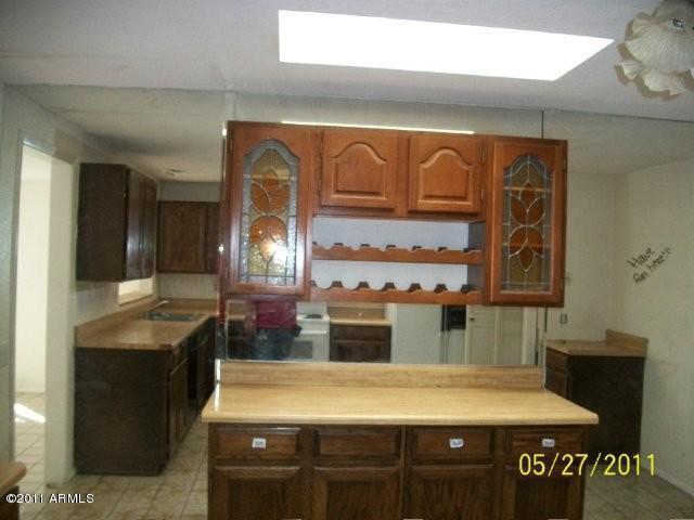 1831 West Decatur Street Mesa, AZ 85201 - Photo 5 of 10 a kitchen with a sink and cabinets