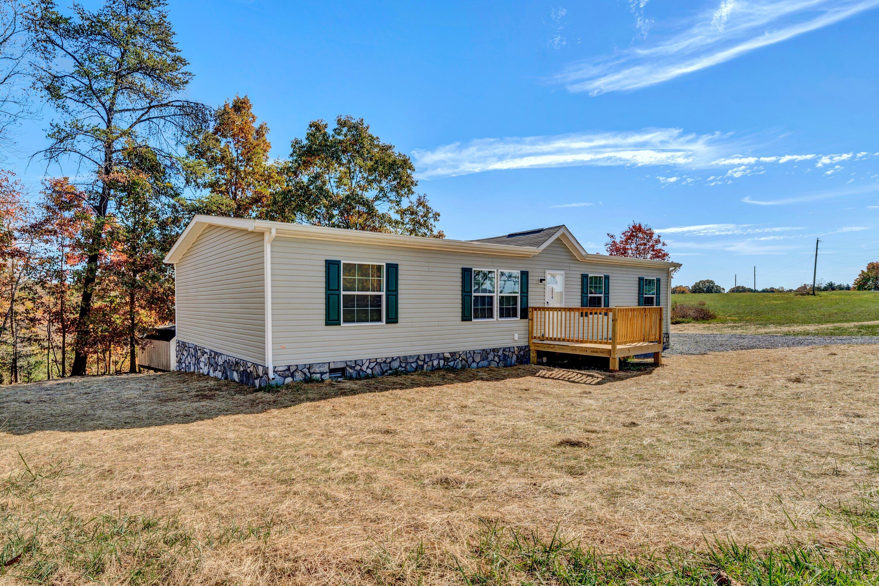 2098 Lipscomb Road Moneta, VA 24121 - Photo 2 of 27 a view of a house with backyard