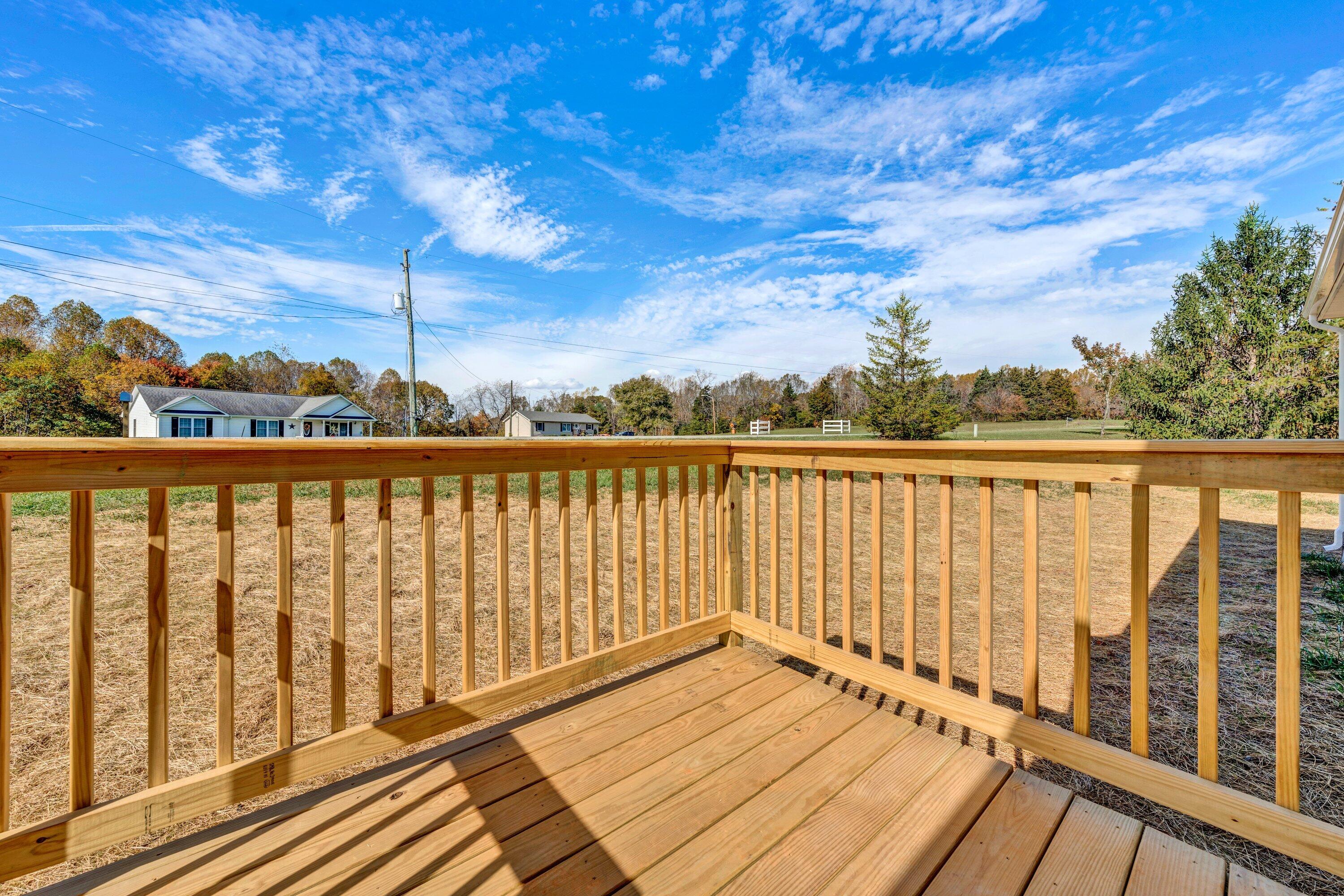 2098 Lipscomb Road Moneta, VA 24121 - Photo 21 of 27 a view of wooden balcony with outdoor space