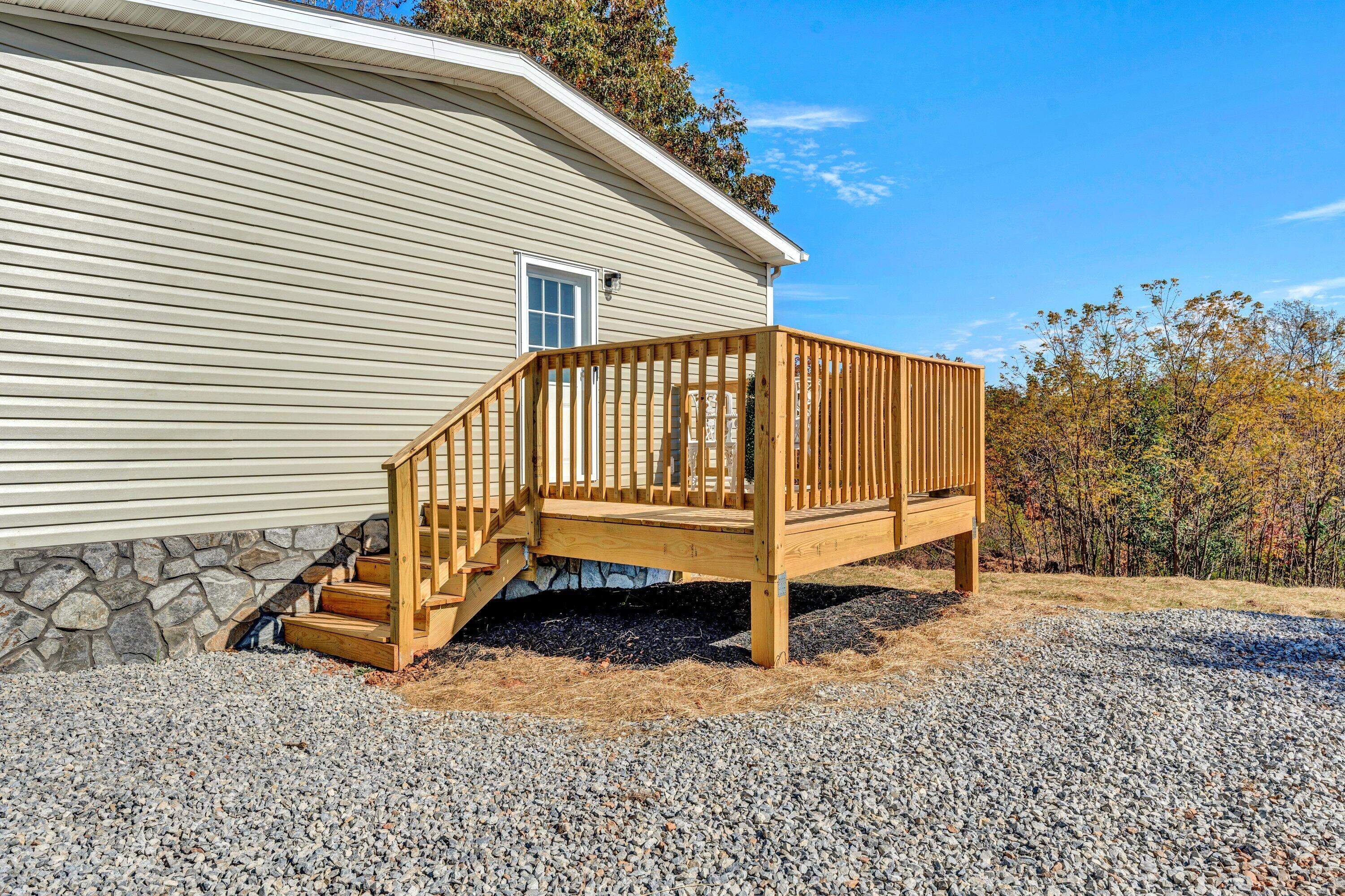 2098 Lipscomb Road Moneta, VA 24121 - Photo 23 of 27 a view of a house with a yard