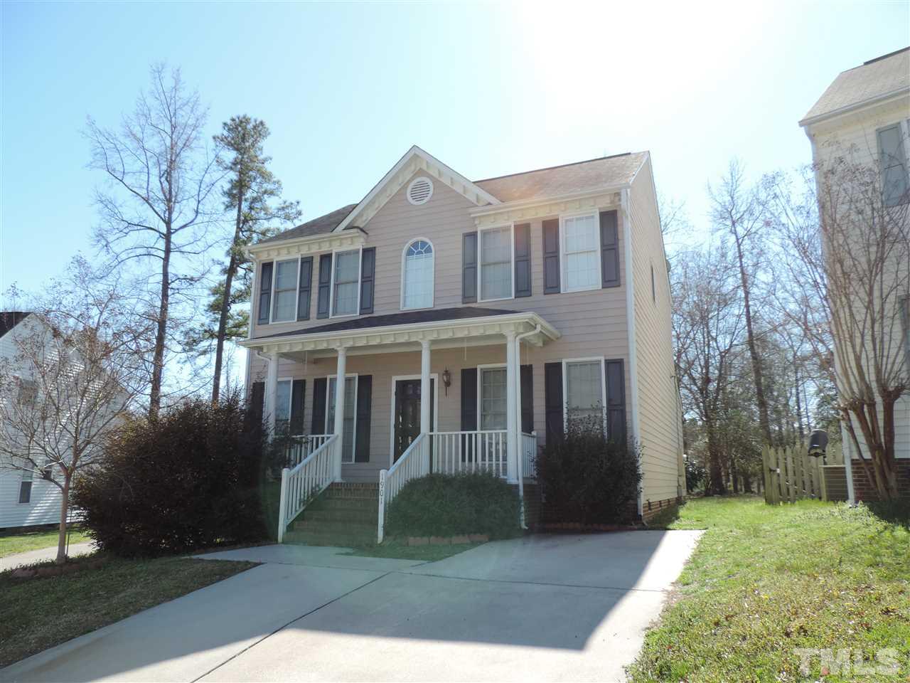 1901 Crag Burn Lane Raleigh, NC 27604 - Photo 1 of 16 a front view of a house with garden