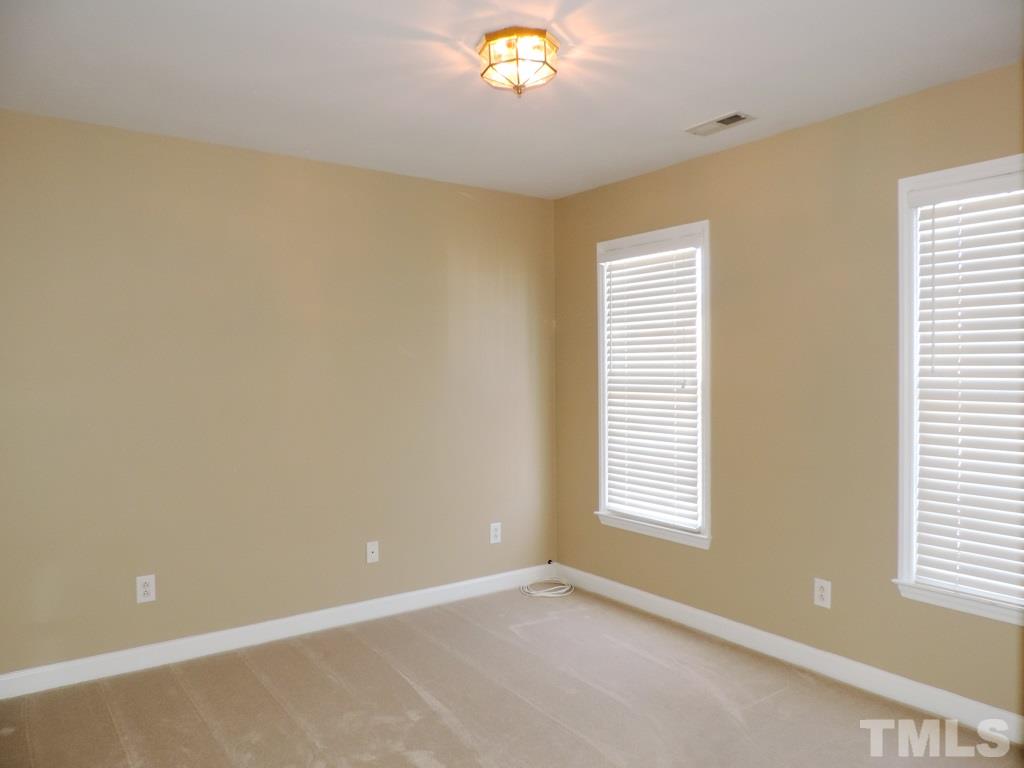 1901 Crag Burn Lane Raleigh, NC 27604 - Photo 14 of 16 a view of an empty room with a window