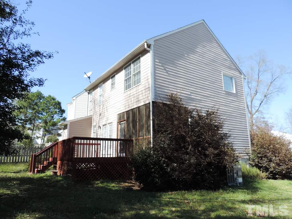 1901 Crag Burn Lane Raleigh, NC 27604 - Photo 15 of 16 a view of a house with a yard