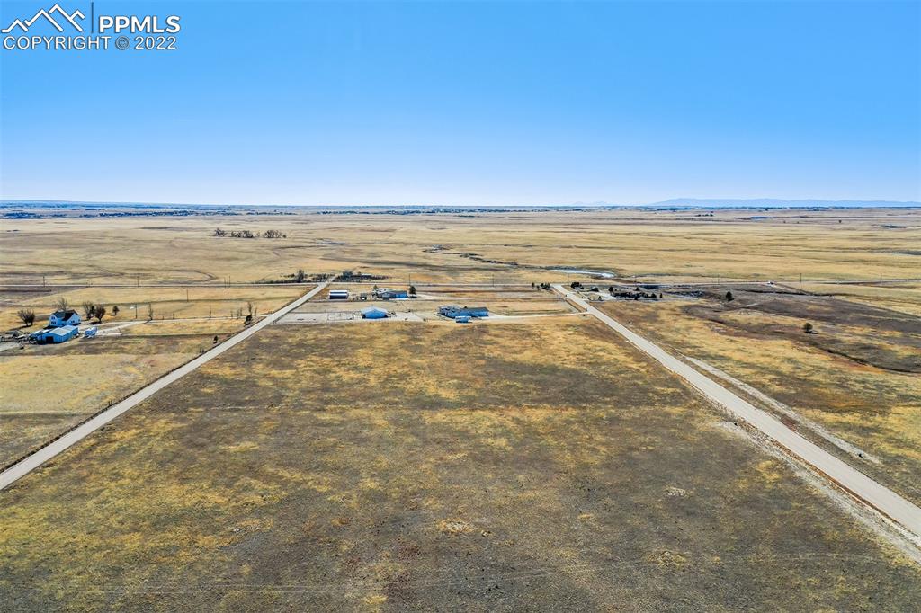 14920 Tiboria Loop Peyton, CO 80831 - Photo 4 of 34 a view of an ocean and beach