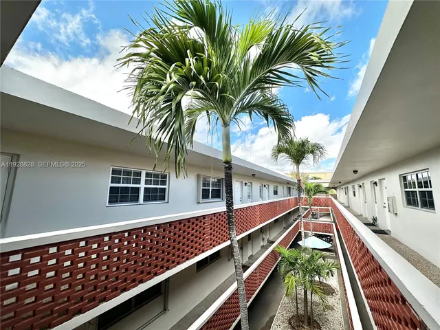 a view of outdoor space with deck and wooden floor
