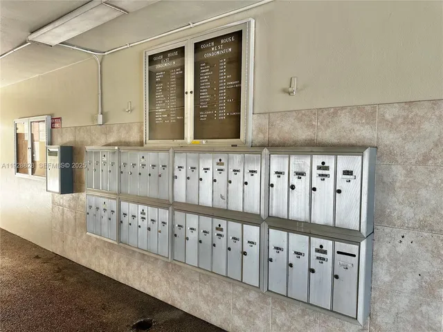 a view of a wooden door with wooden fence