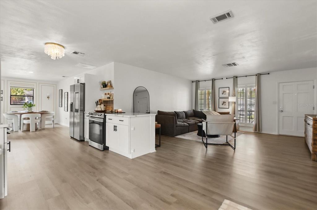611 Bryan Court Altamonte Springs, FL 32701 - Photo 12 of 37 a living room with furniture and a wooden floor