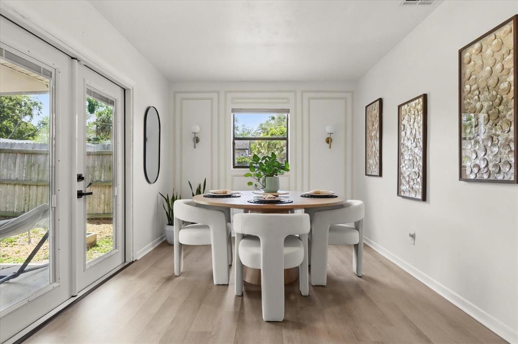611 Bryan Court Altamonte Springs, FL 32701 - Photo 17 of 37 a view of a dining room with furniture window and outside view