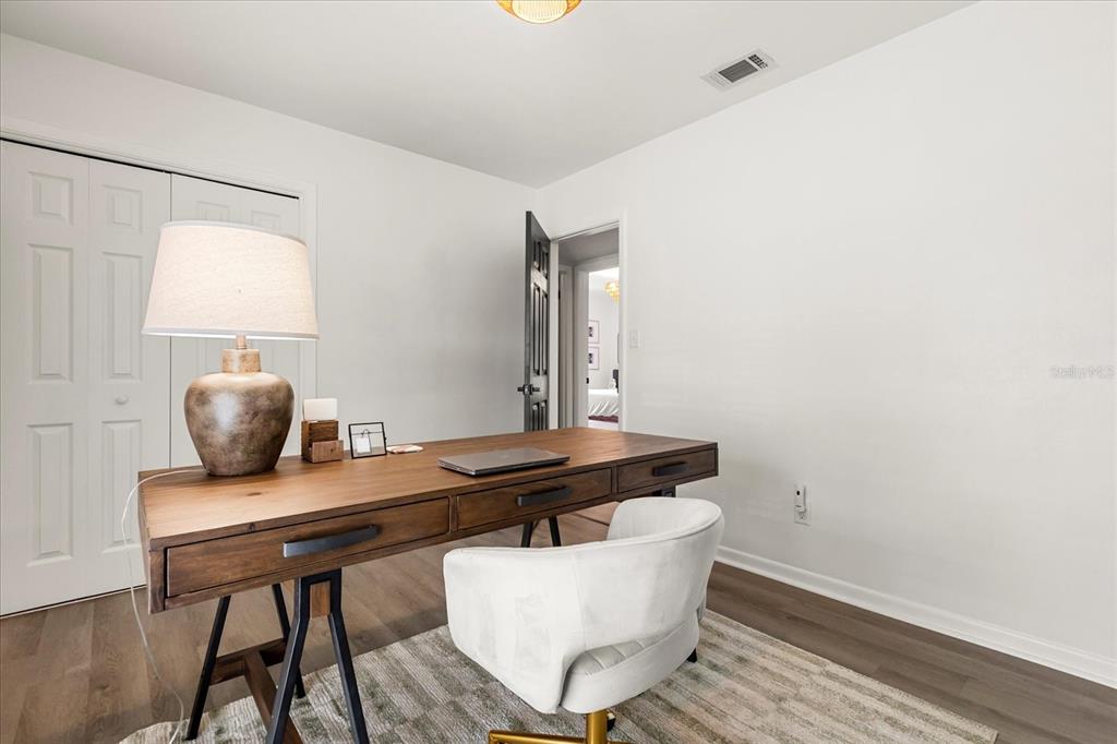 611 Bryan Court Altamonte Springs, FL 32701 - Photo 22 of 37 a view of a workspace room with wooden floor