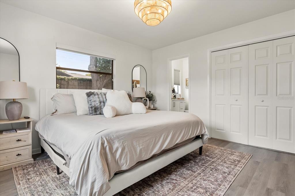 611 Bryan Court Altamonte Springs, FL 32701 - Photo 25 of 37 a bedroom with bed and a window