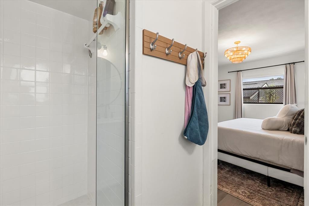 611 Bryan Court Altamonte Springs, FL 32701 - Photo 27 of 37 a bedroom with a bed and a walk in closet