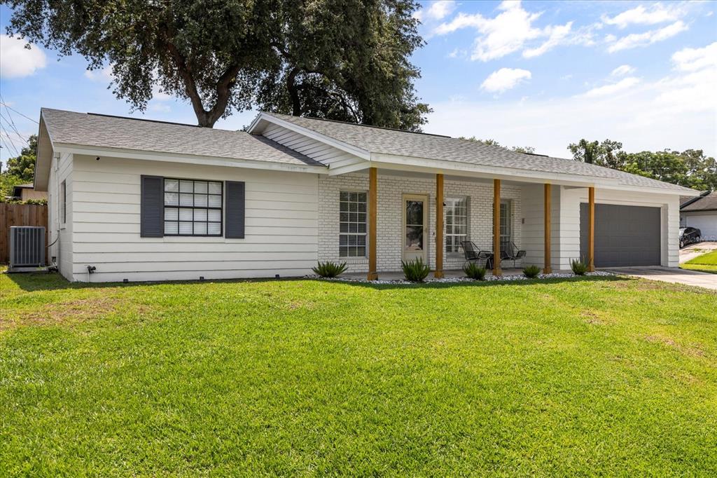 611 Bryan Court Altamonte Springs, FL 32701 - Photo 4 of 37 front view of a house with a yard