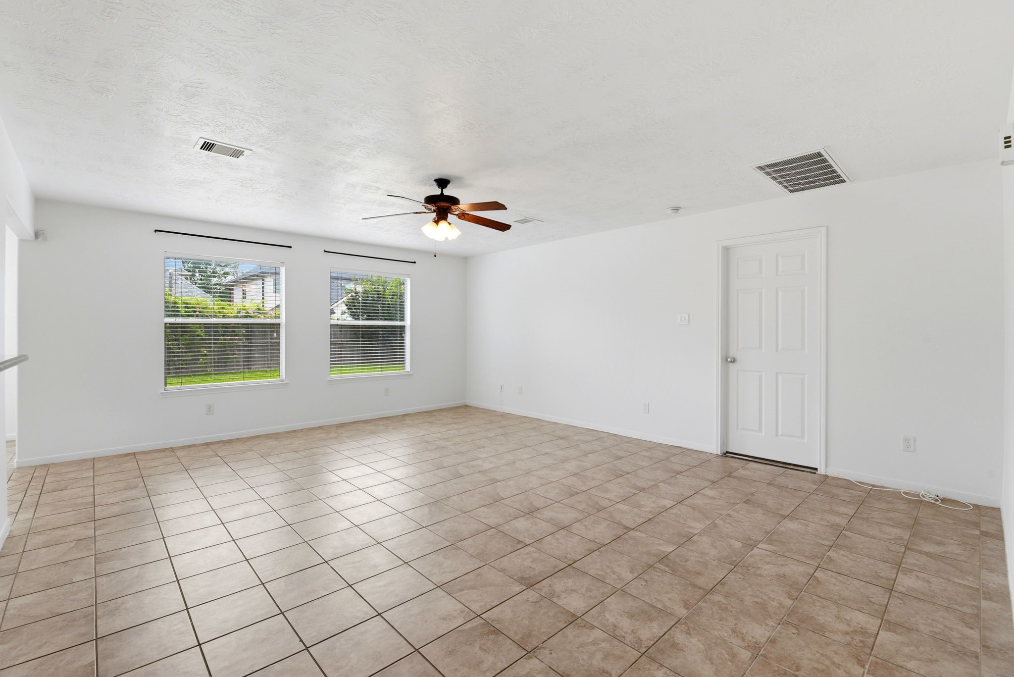 22102 Bridgestone Crossing Drive Spring, TX 77388 - Photo 14 of 38 a view of an empty room with windows