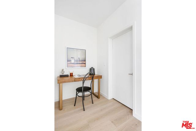 a workspace room with table and chair