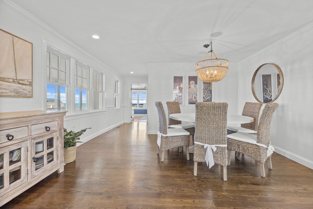 48 Collier Road Scituate, MA 02066 - Photo 11 of 42 a view of a dining room with furniture and wooden floor