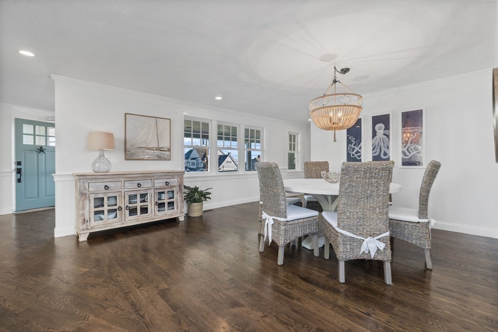 48 Collier Road Scituate, MA 02066 - Photo 12 of 42 a view of a dining room with furniture window and wooden floor