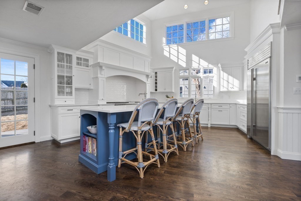 48 Collier Road Scituate, MA 02066 - Photo 13 of 42 a view of dining table chairs and wooden floor