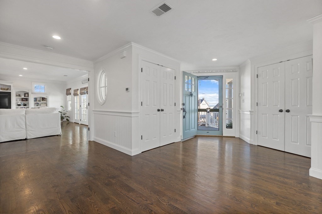 48 Collier Road Scituate, MA 02066 - Photo 20 of 42 a view of a kitchen with wooden floor and windows