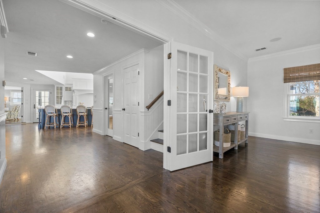 48 Collier Road Scituate, MA 02066 - Photo 21 of 42 a view of entryway with livingroom and wooden floor