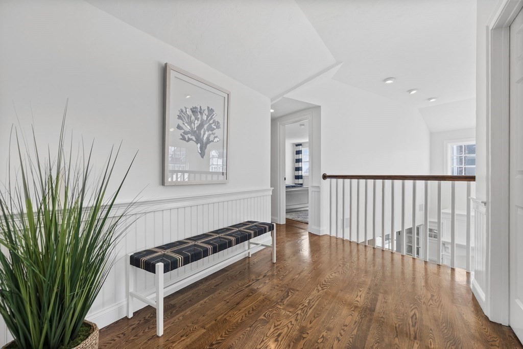 48 Collier Road Scituate, MA 02066 - Photo 24 of 42 a view of wooden floor and a livingroom with furniture