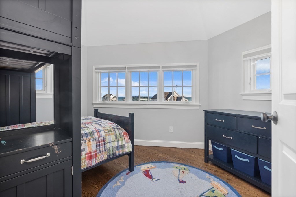 48 Collier Road Scituate, MA 02066 - Photo 26 of 42 a bedroom with a bed and a dresser