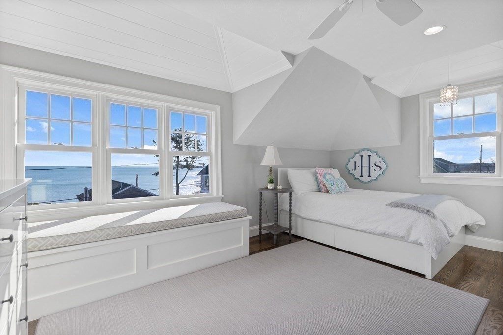 48 Collier Road Scituate, MA 02066 - Photo 29 of 42 a bedroom with a bed and a window