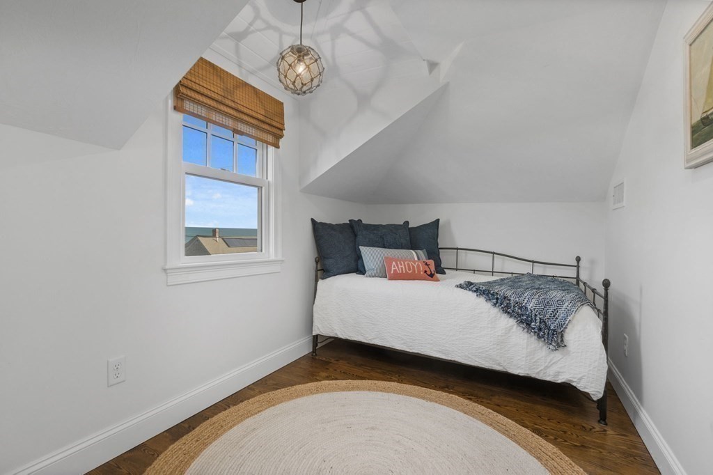 48 Collier Road Scituate, MA 02066 - Photo 31 of 42 a bedroom with a bed and a window