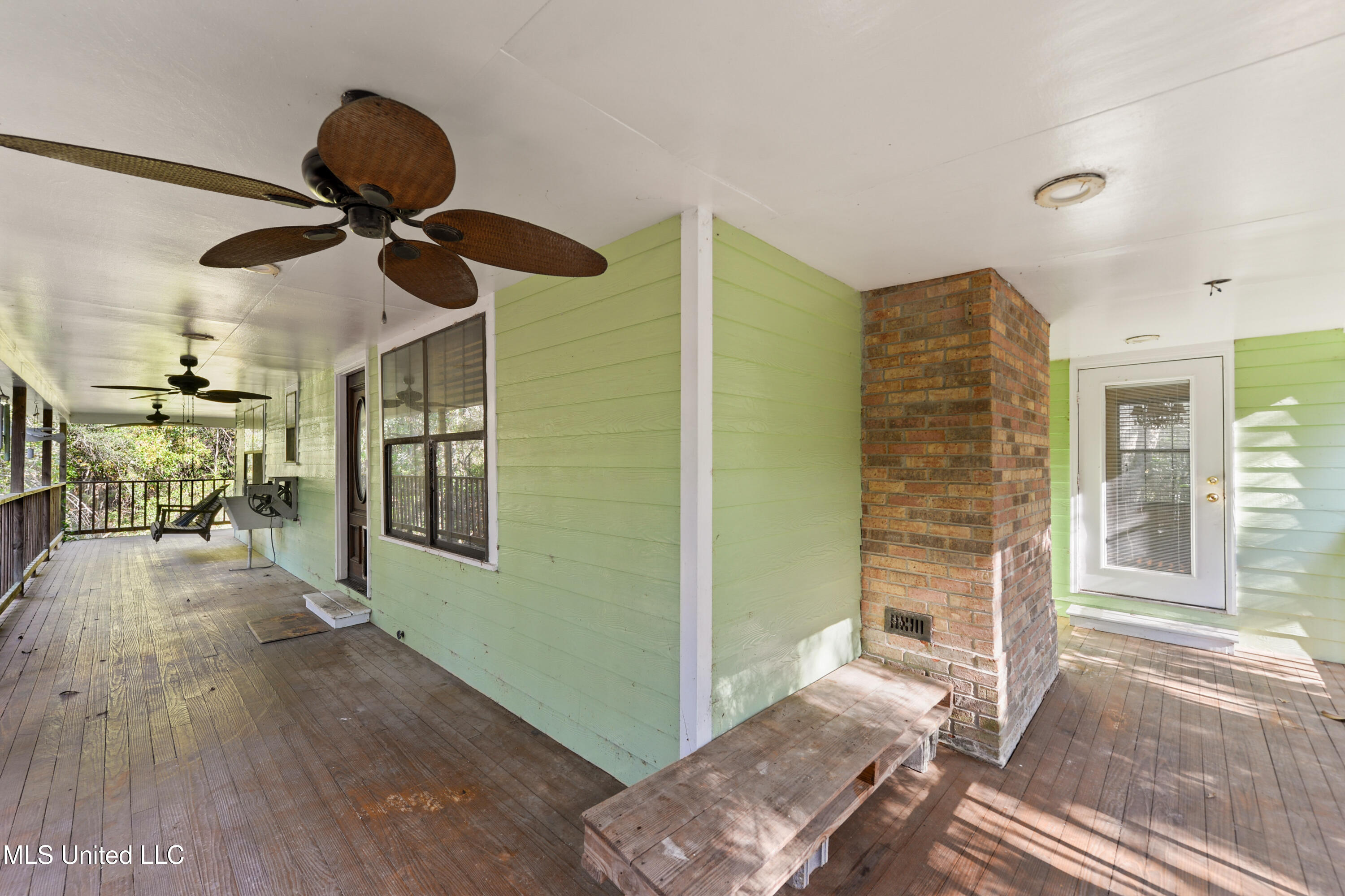 11054 Coleman Road Gulfport, MS 39503 - Photo 1 of 24 Front Porch View South Side