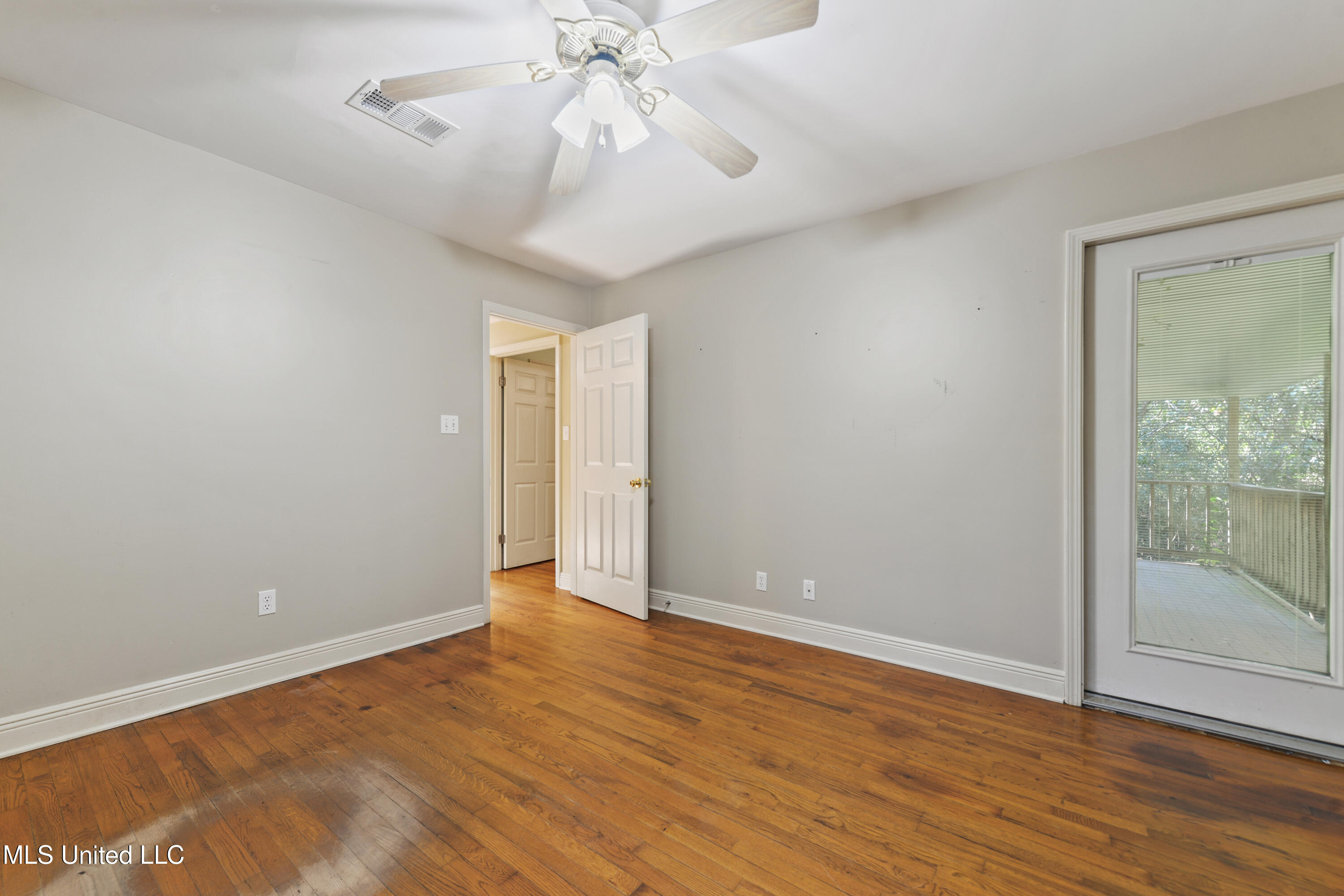 11054 Coleman Road Gulfport, MS 39503 - Photo 20 of 24 Bedroom 3 with Exterior Door to Porch