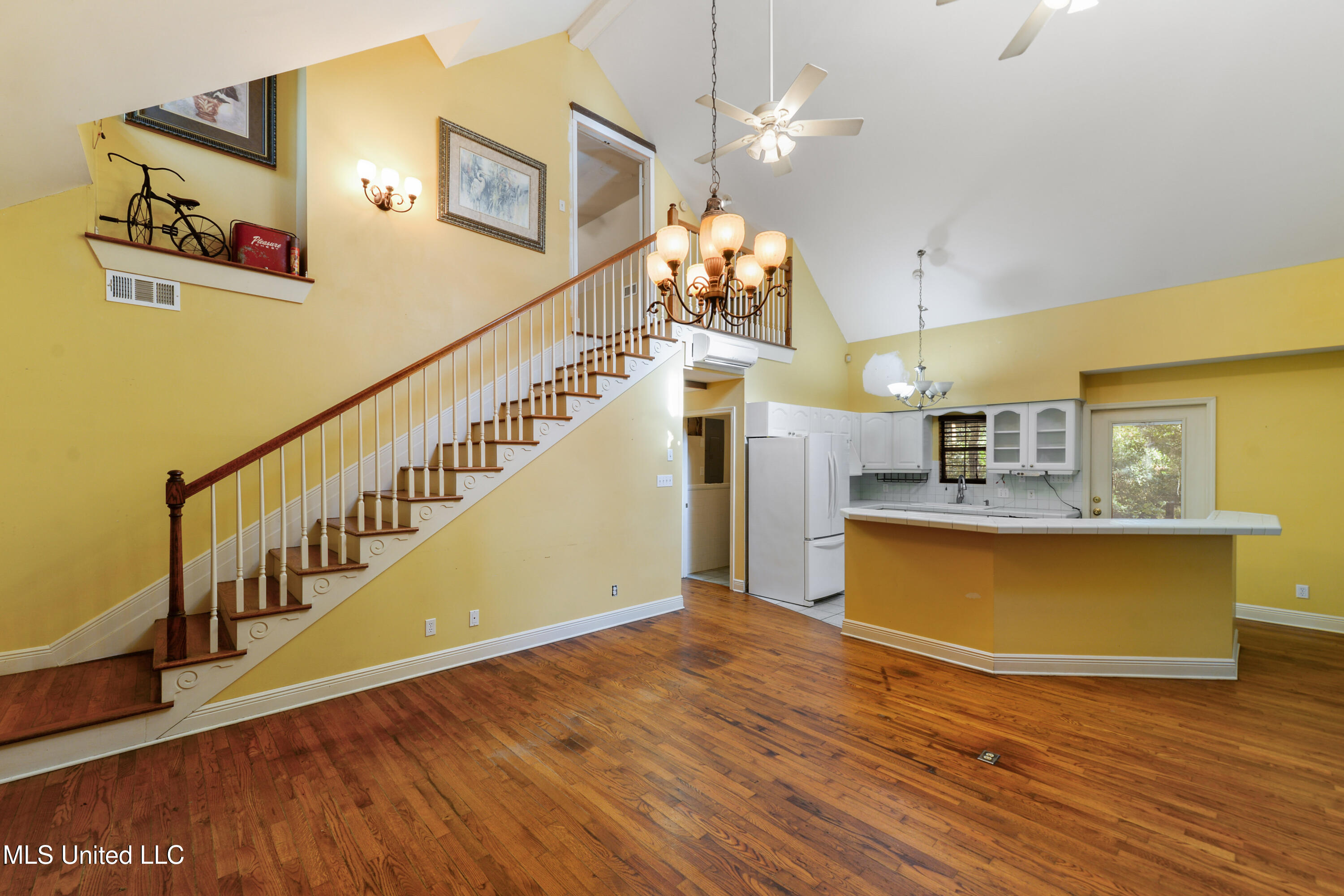 11054 Coleman Road Gulfport, MS 39503 - Photo 6 of 24 Living Room View of Kitchen and Stairs