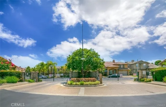 a view of a street with a building in the background