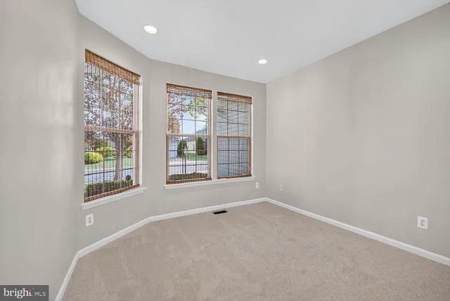 a big room with windows and closet