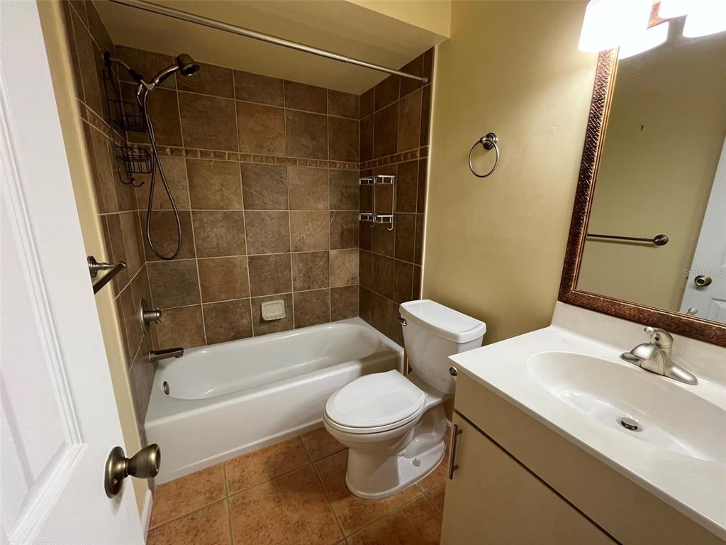 25225 Rampart Boulevard, Unit 2107 Punta Gorda, FL 33983 - Photo 5 of 10 a bathroom with a toilet and a sink