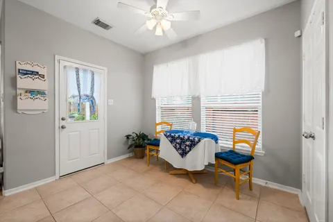 a living room with furniture and decor