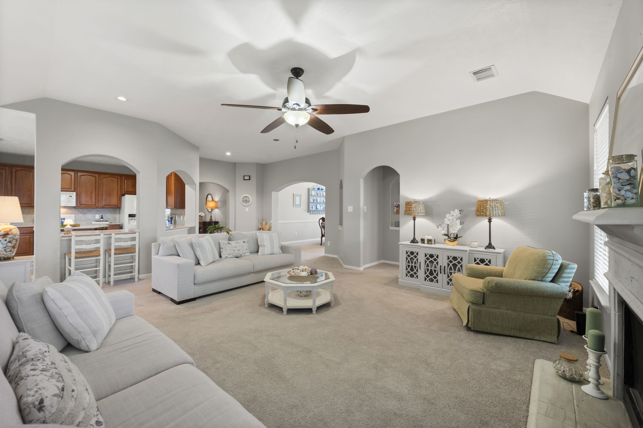 8407 Oak Villa Court Spring, TX 77389 - Photo 20 of 40 a living room with furniture or chandelier and a couch