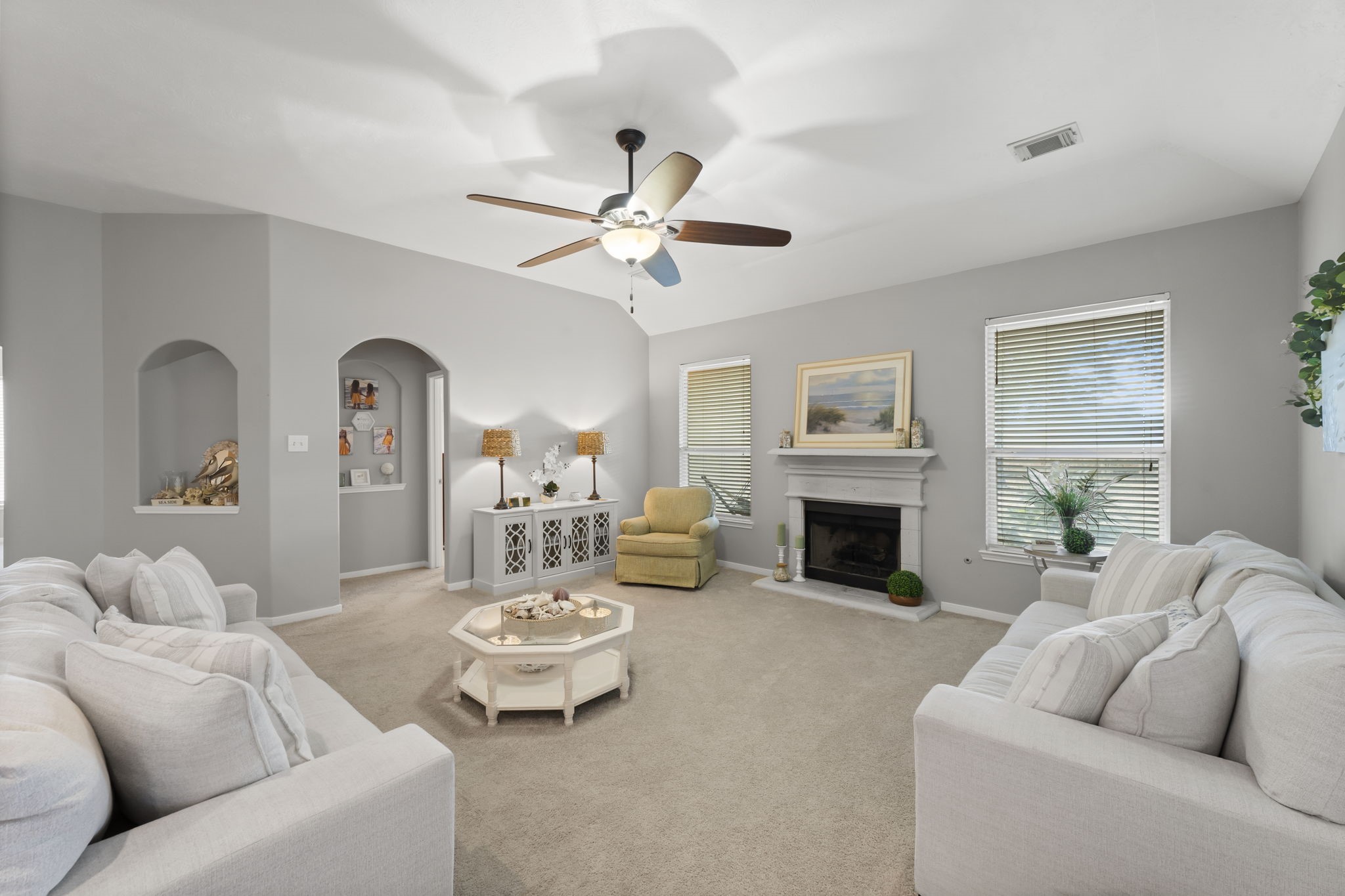 8407 Oak Villa Court Spring, TX 77389 - Photo 22 of 40 a living room with furniture a fireplace and a window