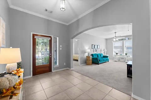 a view of livingroom with furniture and chandelier