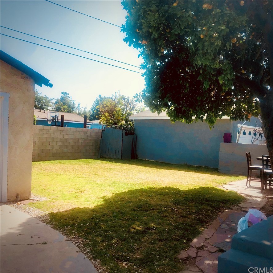 406 West Elm Street Compton, CA 90220 - Photo 16 of 16 a view of a pool with an outdoor space