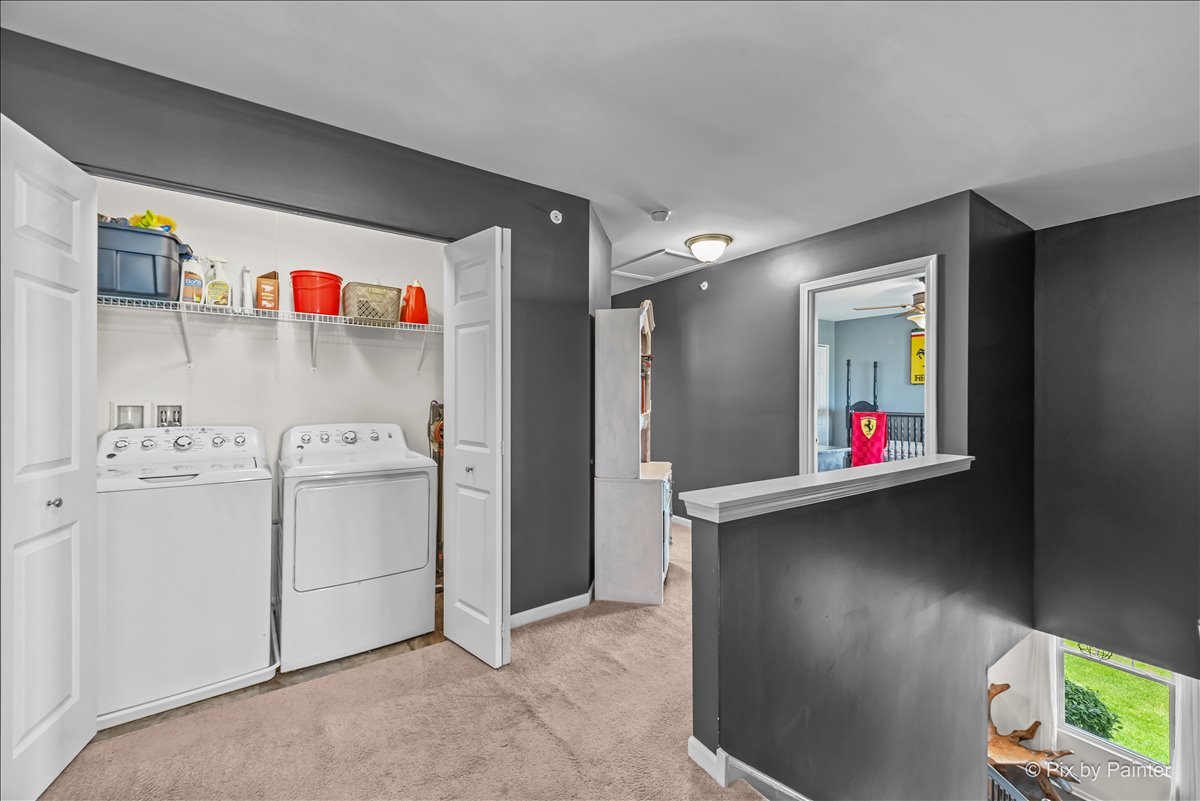 16207 West Switch Grass Road Lockport, IL 60441 - Photo 27 of 45 a utility room with dryer and washer