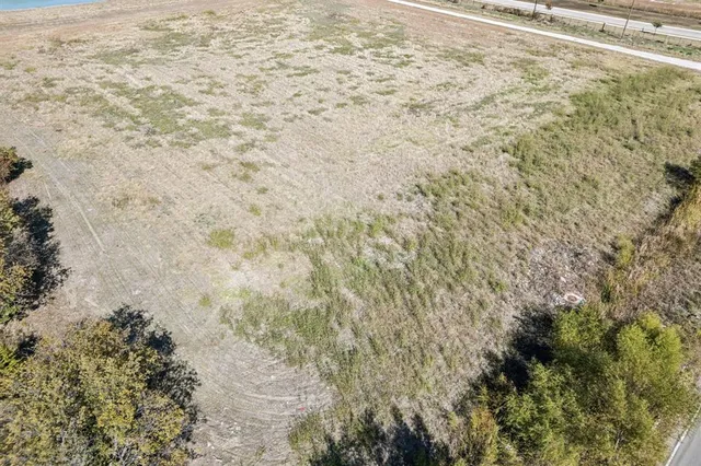 a close up of a wall with a yard