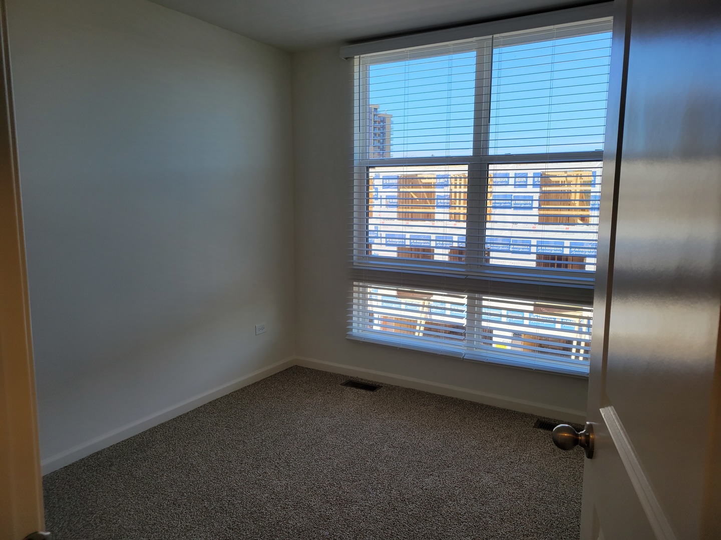 331 Summit Circle Lombard, IL 60148 - Photo 11 of 47 a view of an empty room with a window