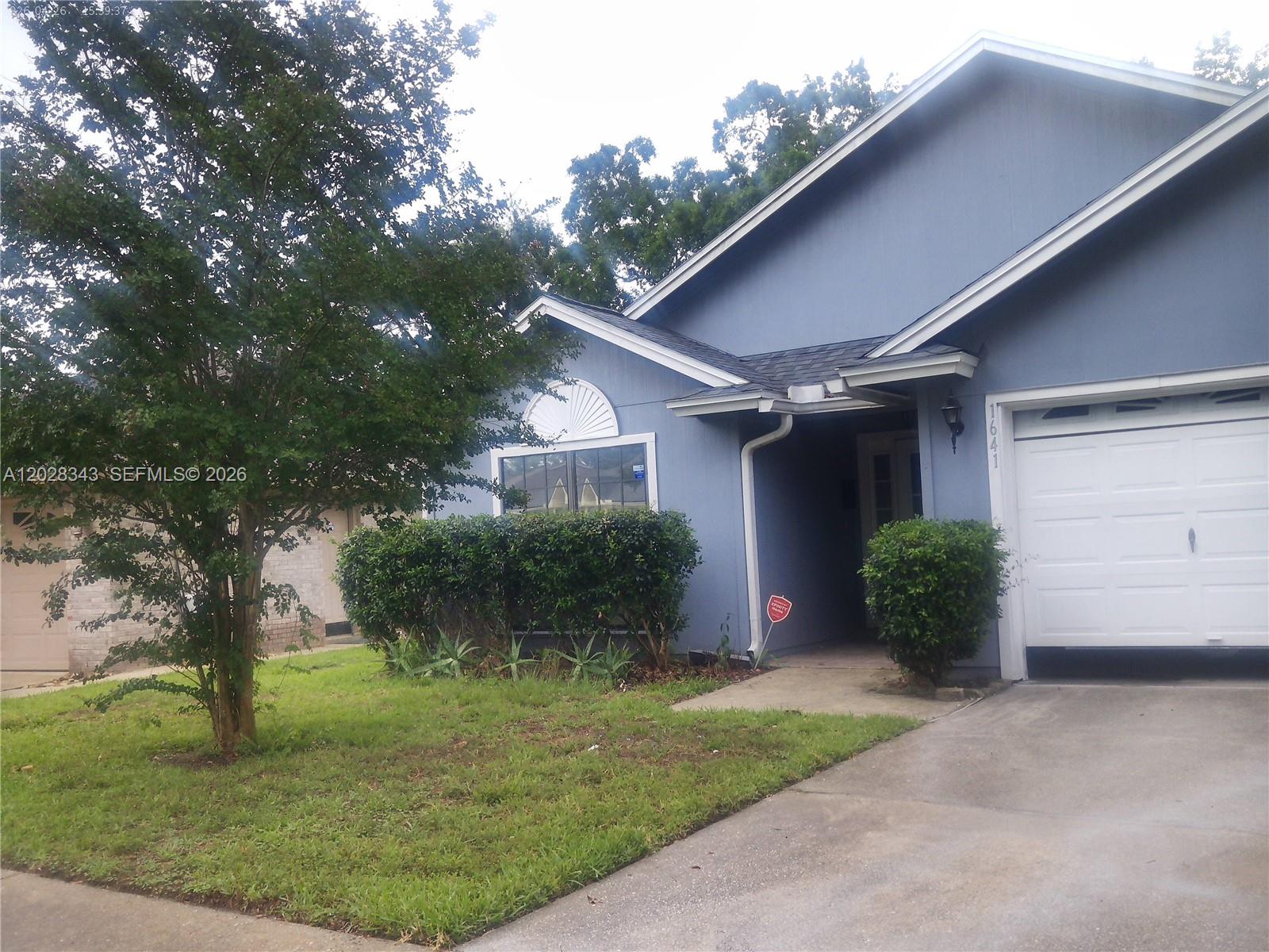 1641 Spring Oaks Lane Jacksonville, FL 32221 - Photo 43 of 44 a front view of a house with garden