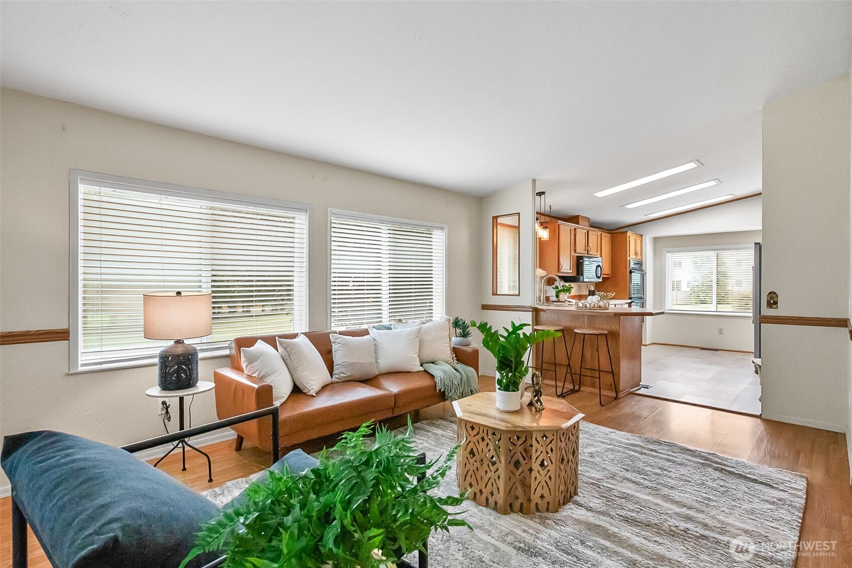 12928 Sultan Basin Road Sultan, WA 98294 - Photo 8 of 39 a living room with furniture and a large window
