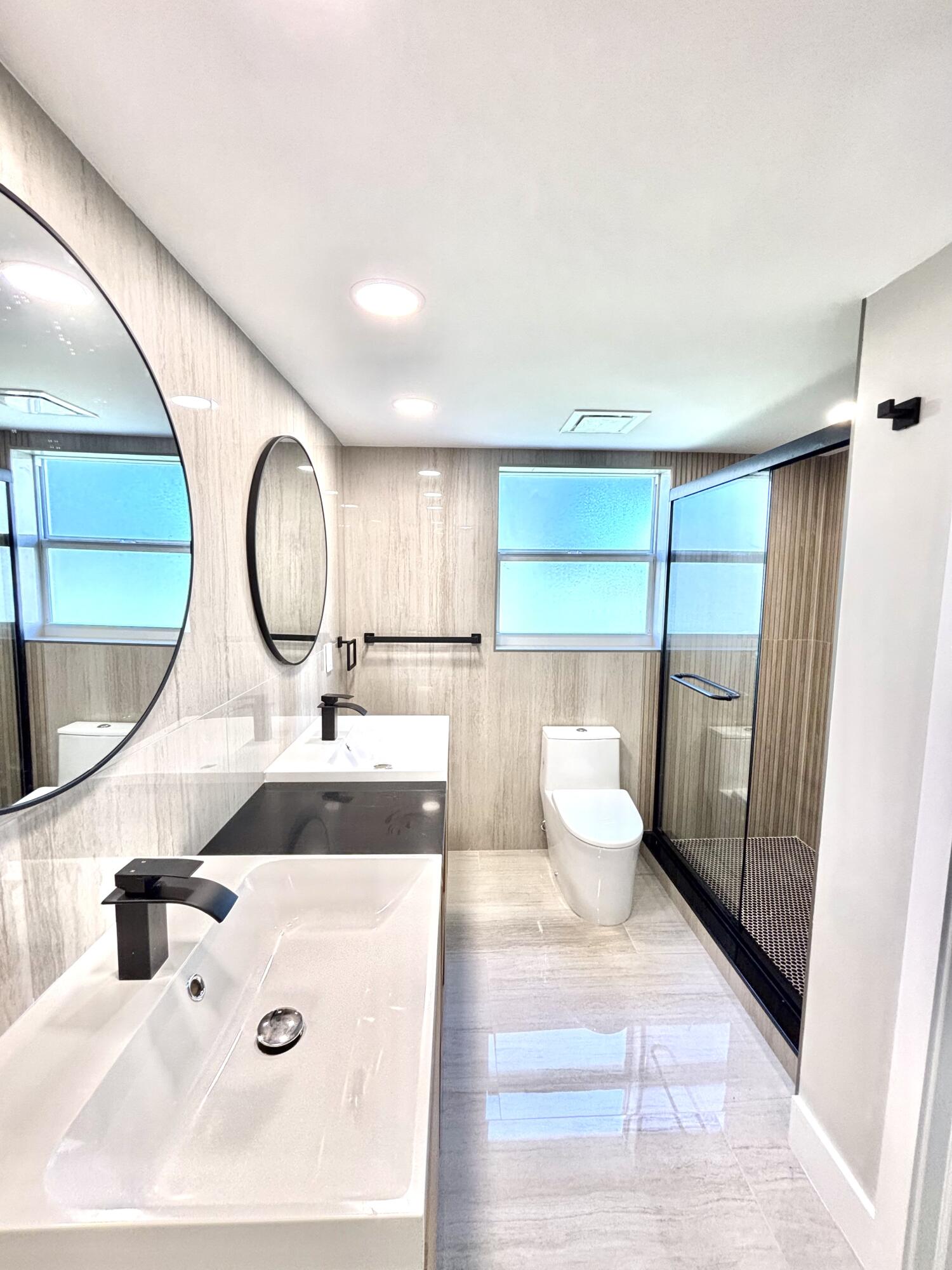 545 Oaks Lane, Unit 201 Pompano Beach, FL 33069 - Photo 14 of 22 a living room with furniture and a large window