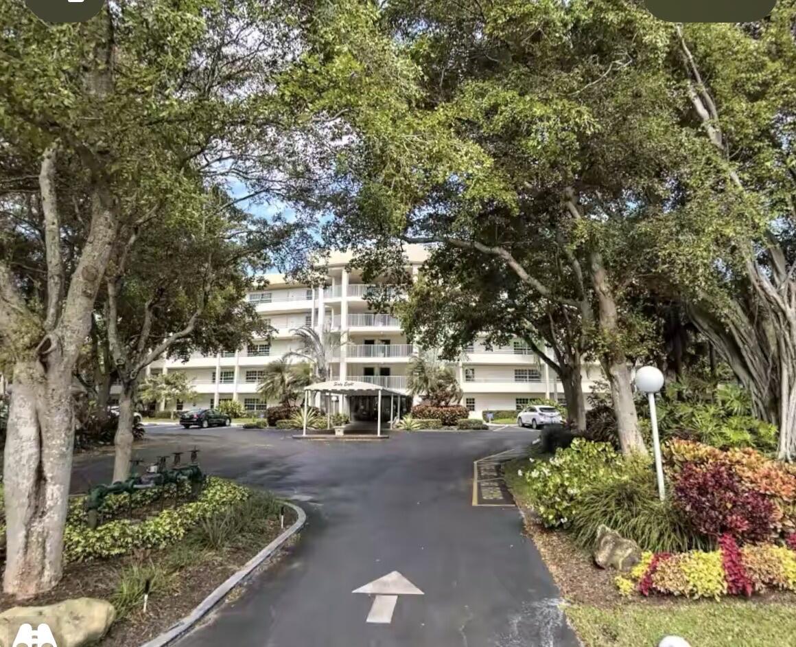 545 Oaks Lane, Unit 201 Pompano Beach, FL 33069 - Photo 21 of 22 a city view with tall buildings