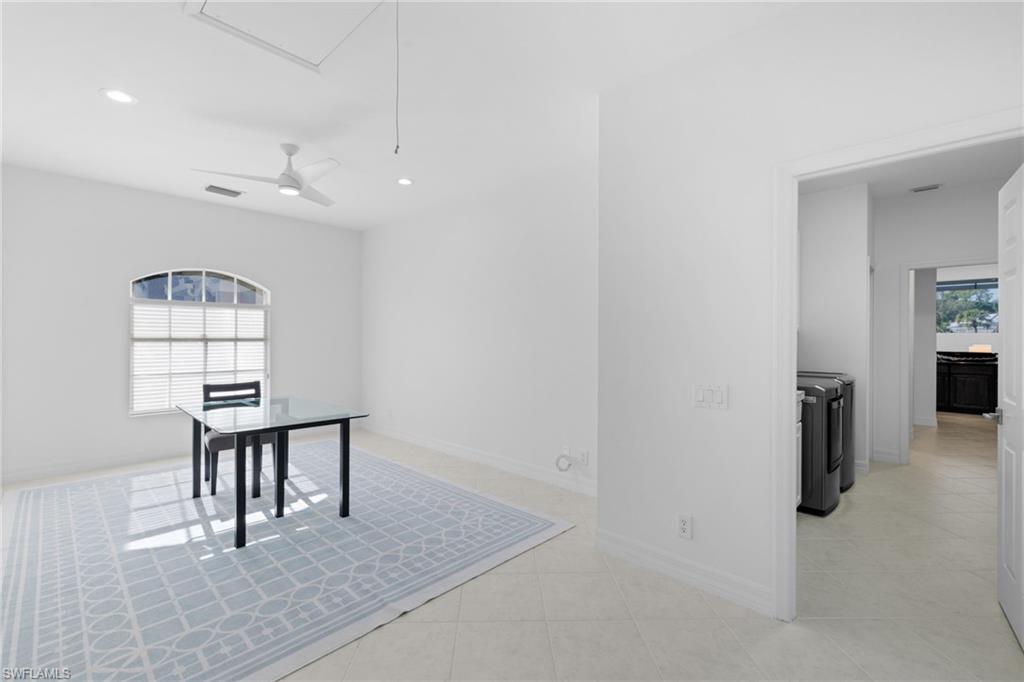 1624 Manchester Court Naples, FL 34109 - Photo 34 of 49 Dining area with recessed lighting, separate washer and dryer, light tile patterned floors, and ceiling fan