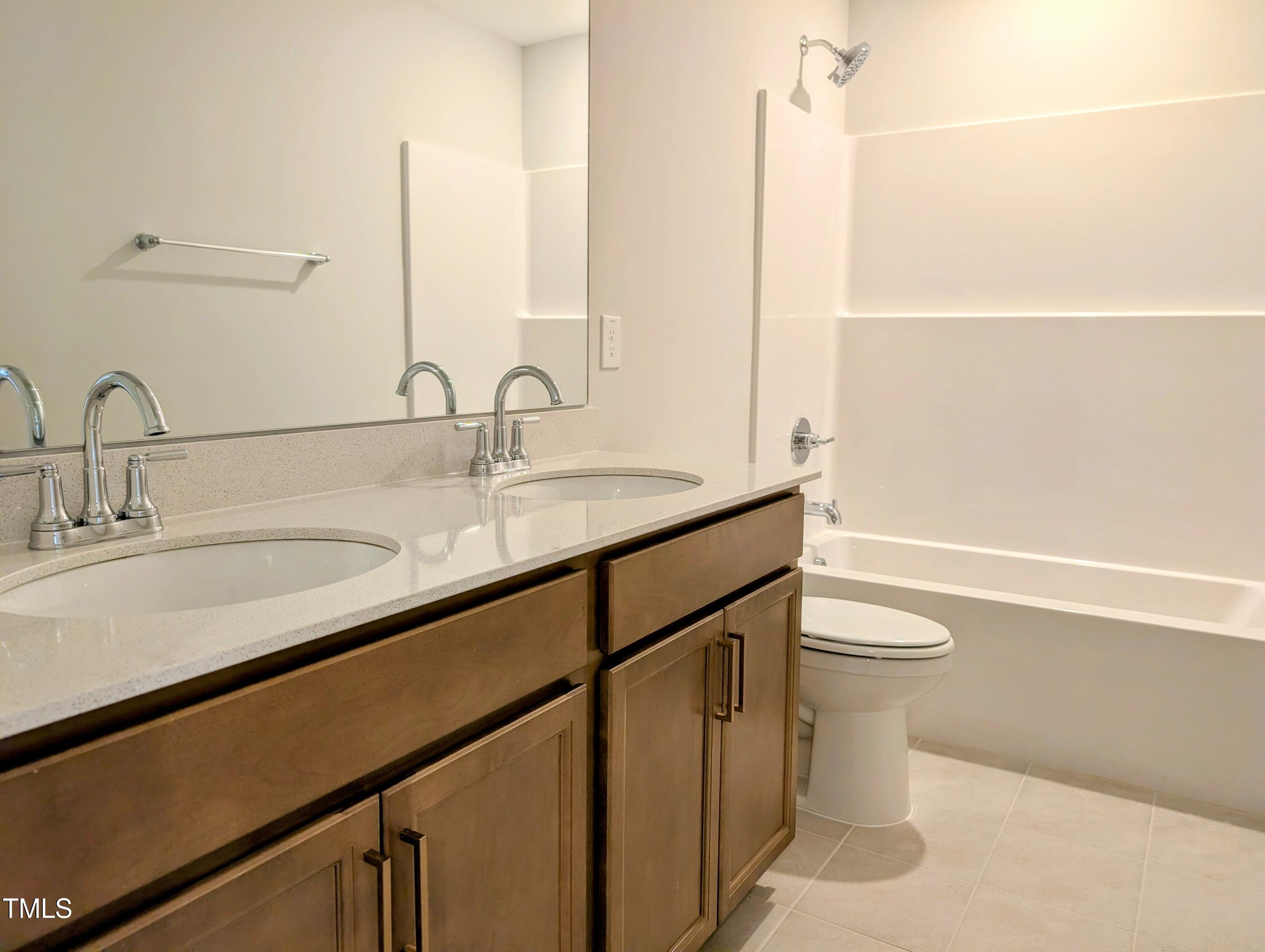 9224 Leaning Post Road, Unit 445 Wake Forest, NC 27587 - Photo 25 of 28 Dual Sinks Hall Bath